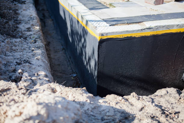 Professional Waterproofing technician working in New Carlisle, IN